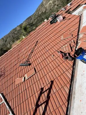 Jose Cruz's Roofing and Construction Logo