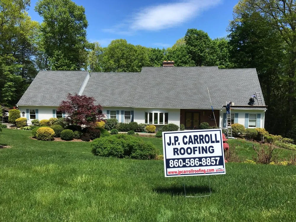 Slide of JP Carroll Roofing