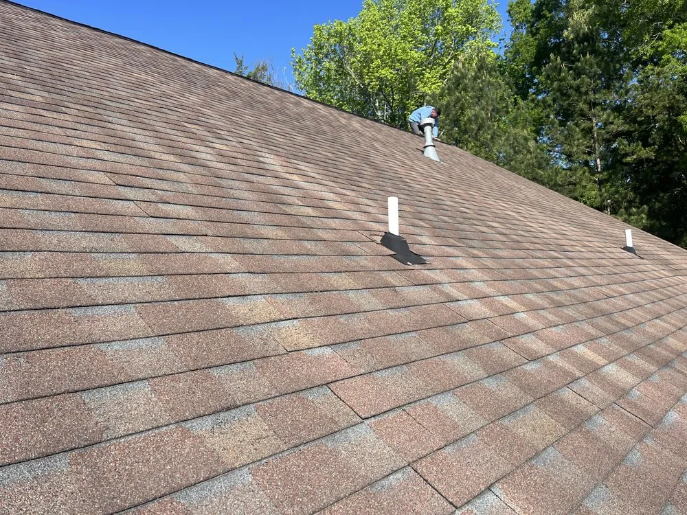 Slide of Jp's Roofing