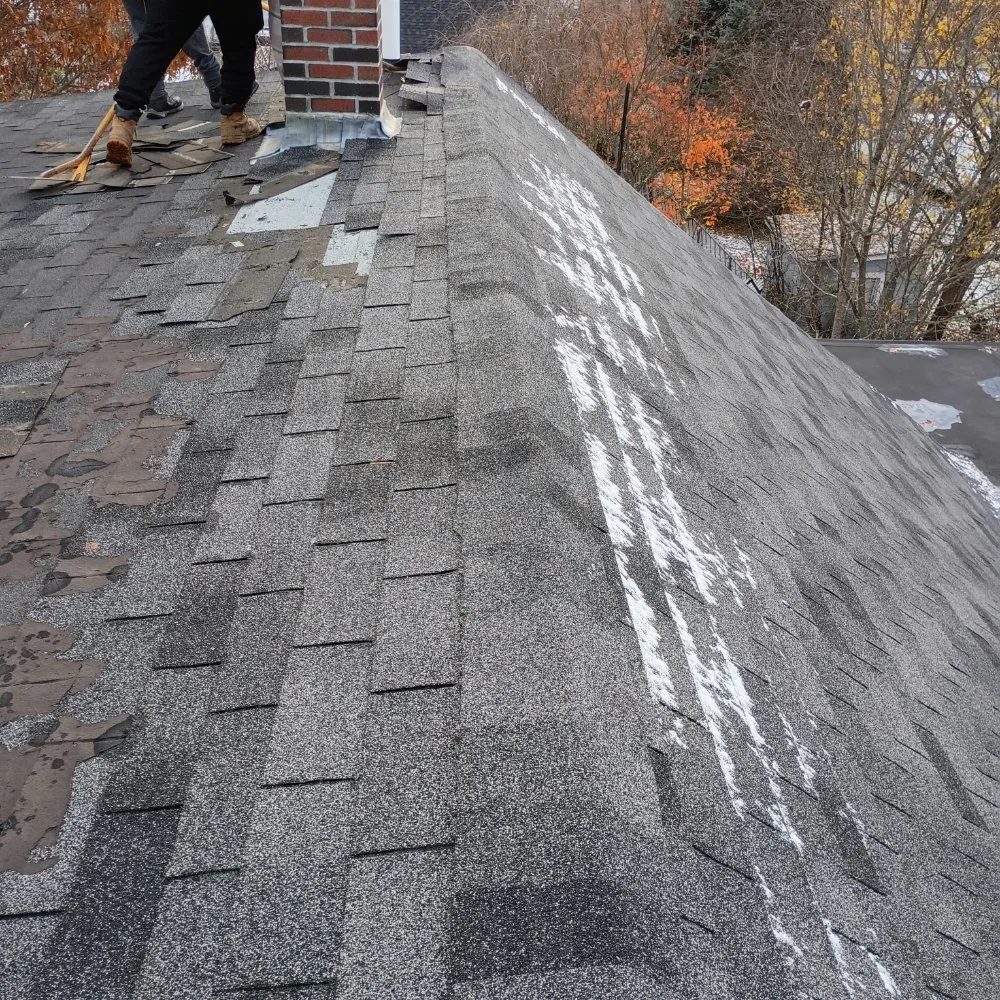 Slide of JQ Roofing & Siding