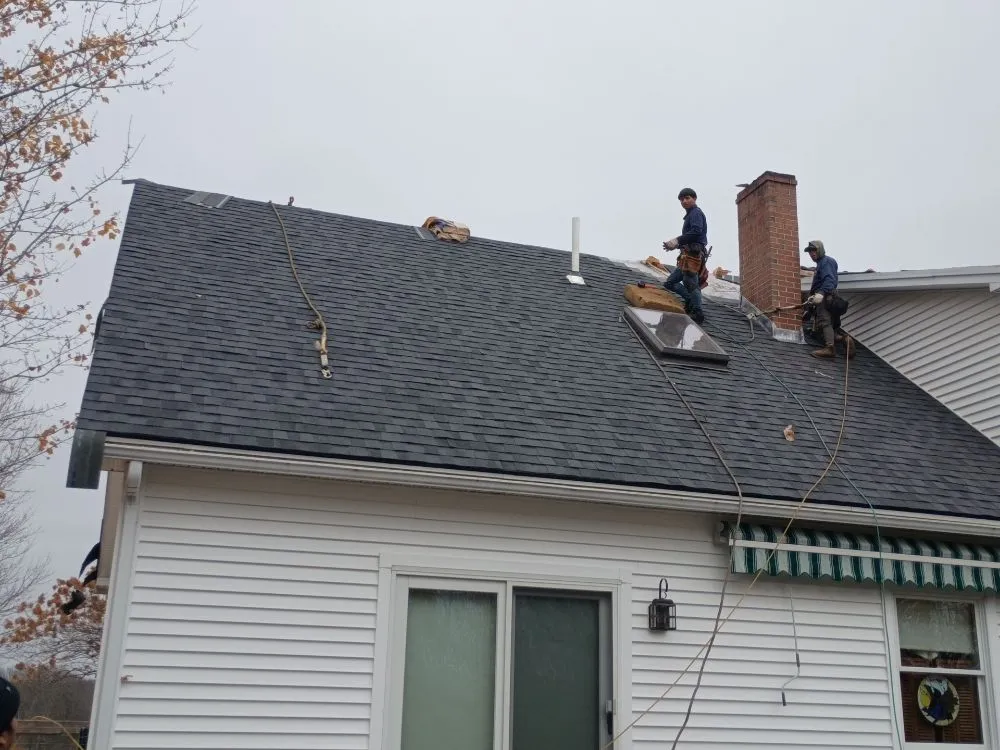 Slide of JQ Roofing & Siding