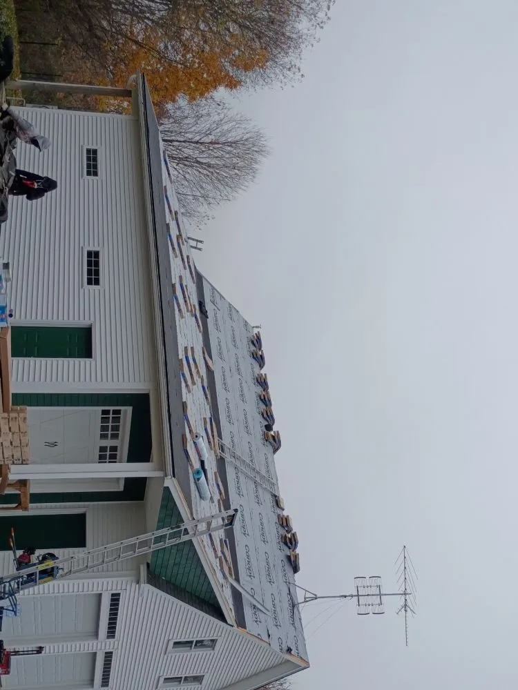 Slide of JQ Roofing & Siding