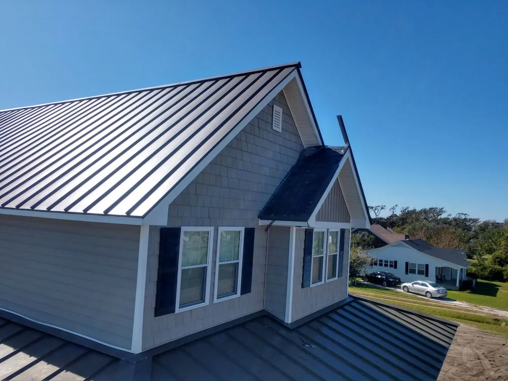 Slide of JR's Roofing and Gutters