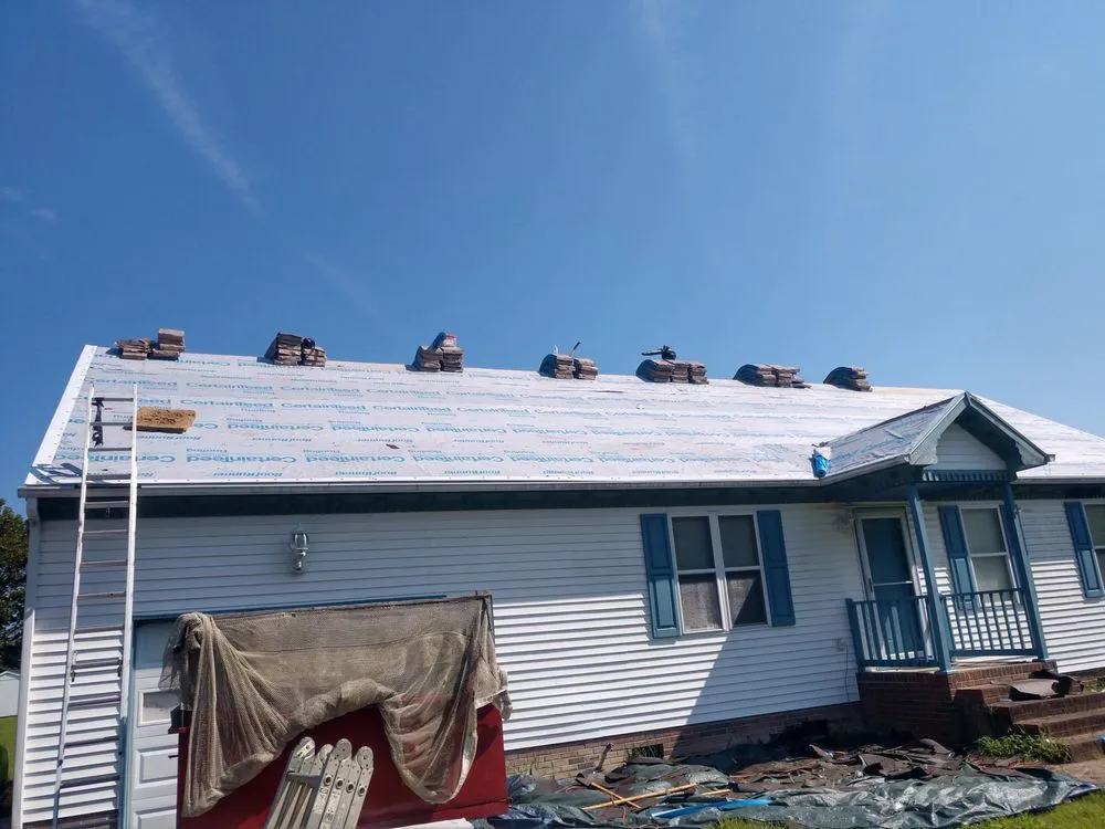 Slide of JR's Roofing and Gutters