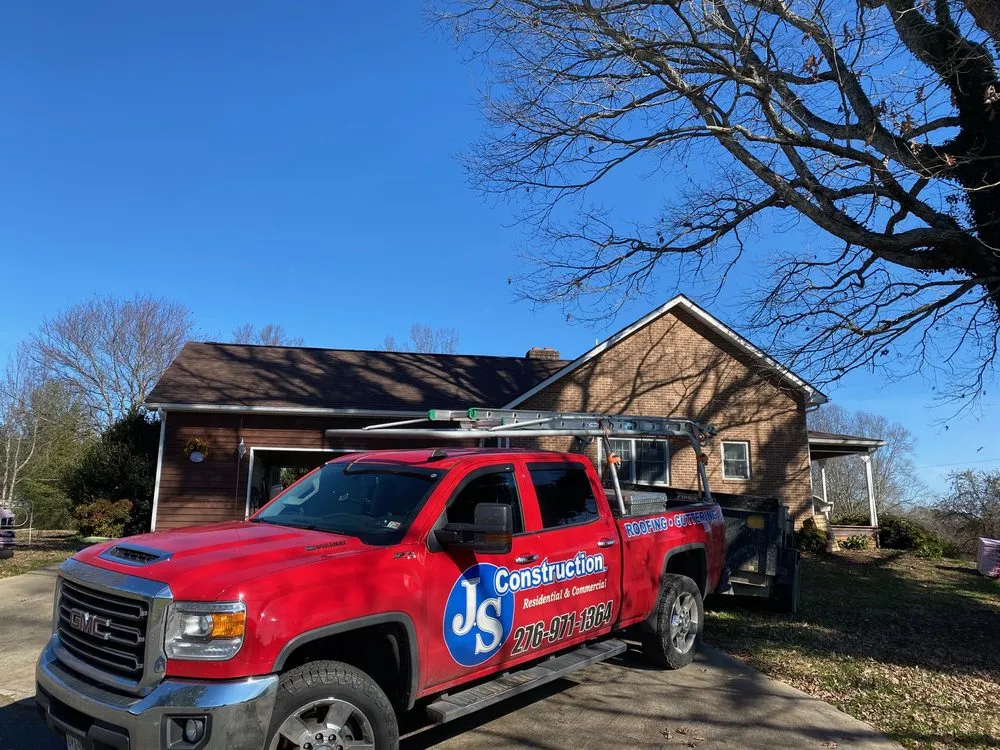 Slide of JS Construction Roofing