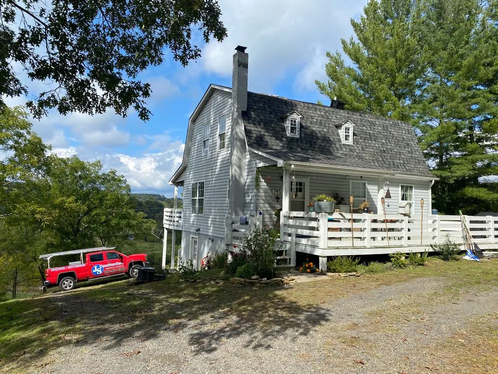 Slide of JS Construction Roofing