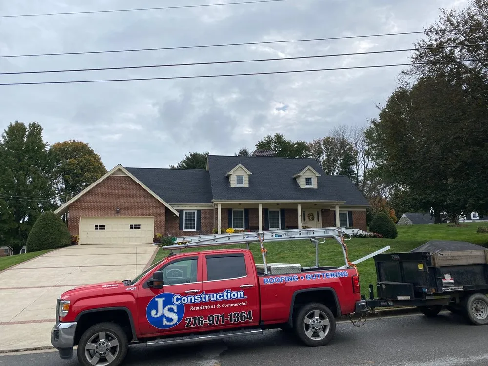 Slide of JS Construction Roofing