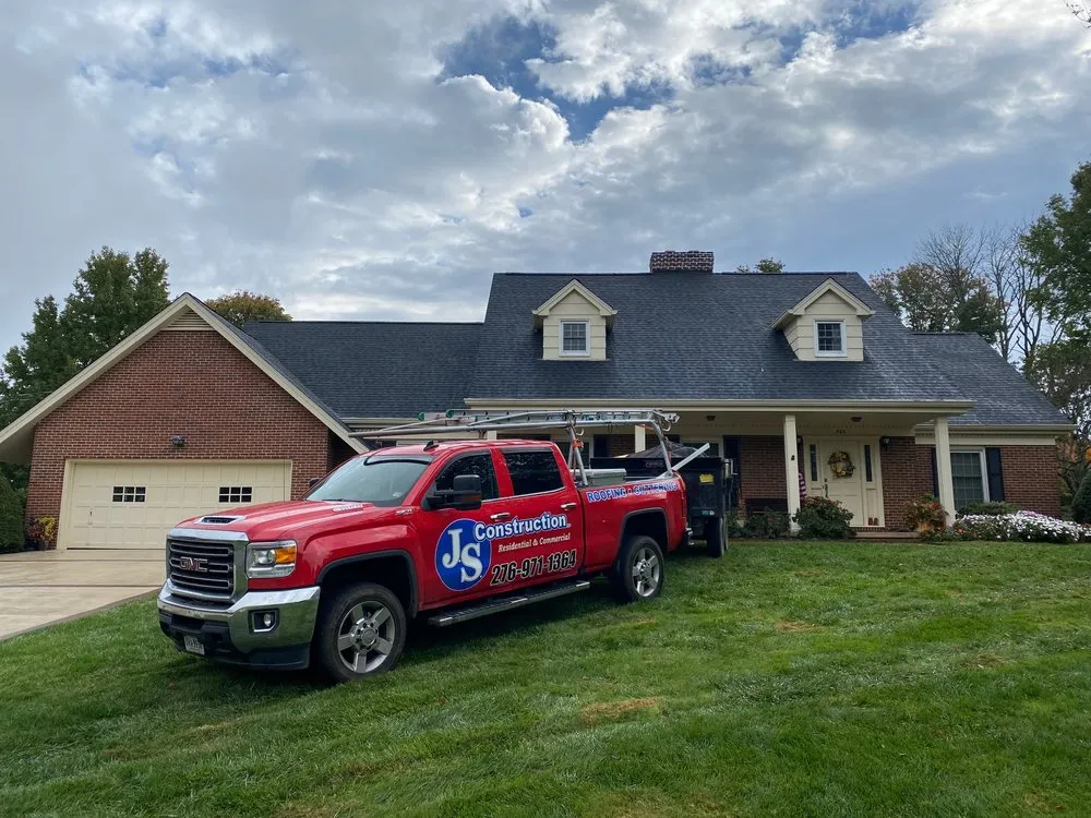 Slide of JS Construction Roofing