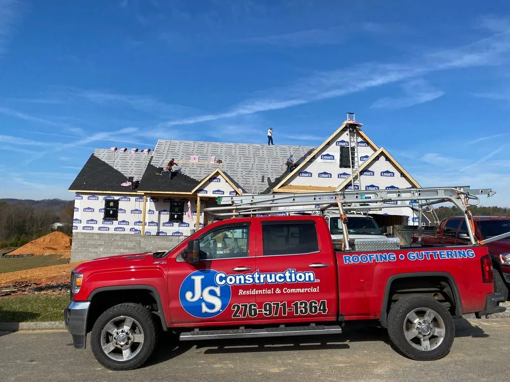 Slide of JS Construction Roofing