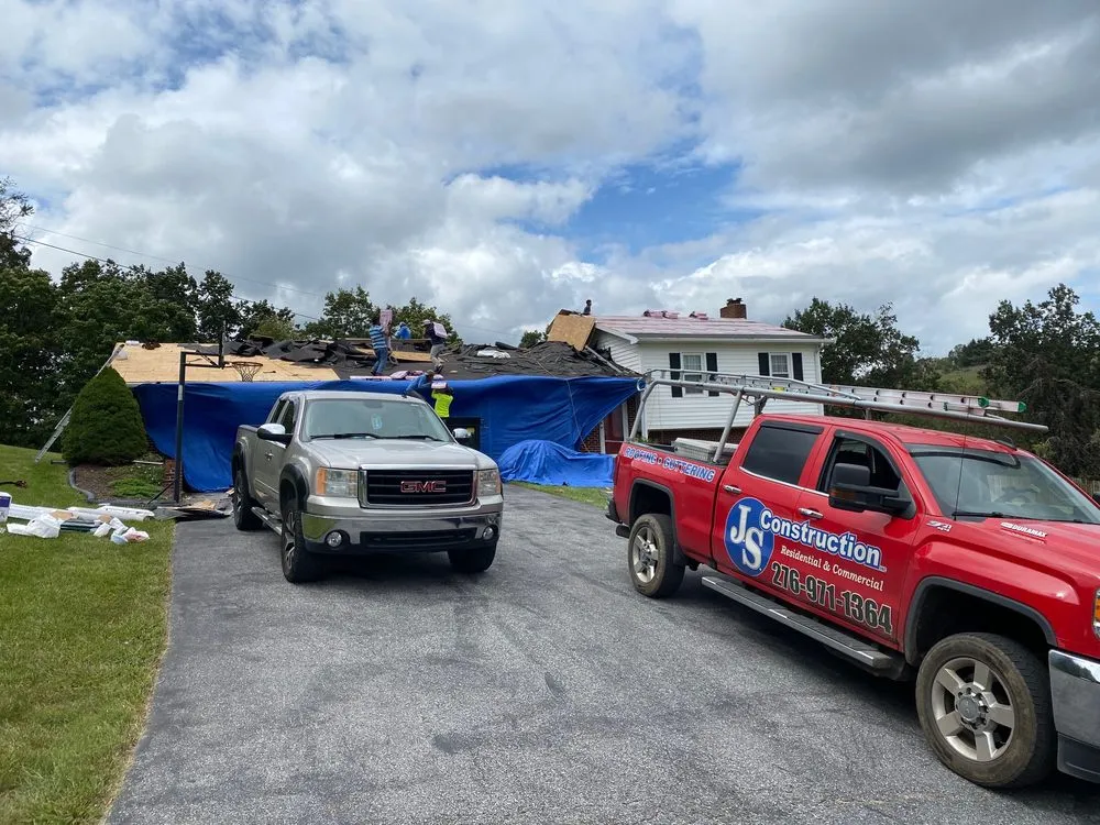 Slide of JS Construction Roofing