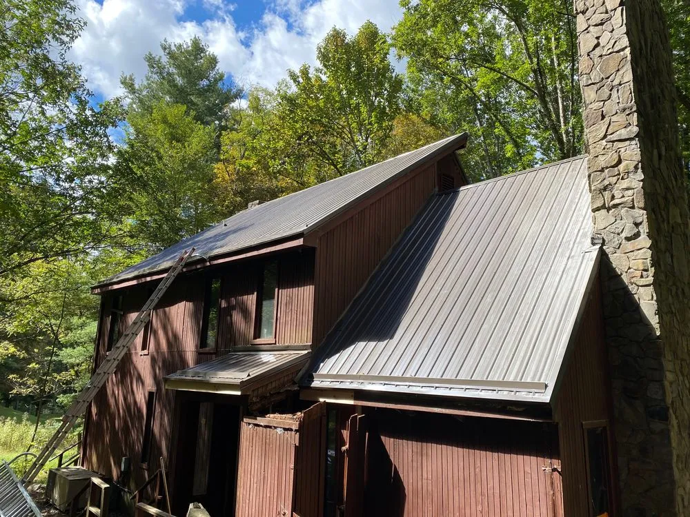 Slide of JS Construction Roofing