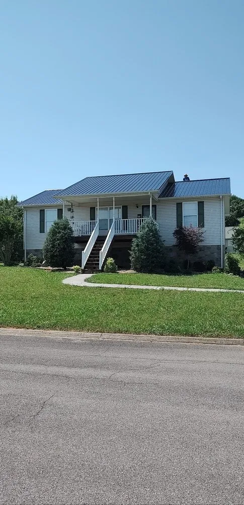 Slide of J'S Metal Roofing