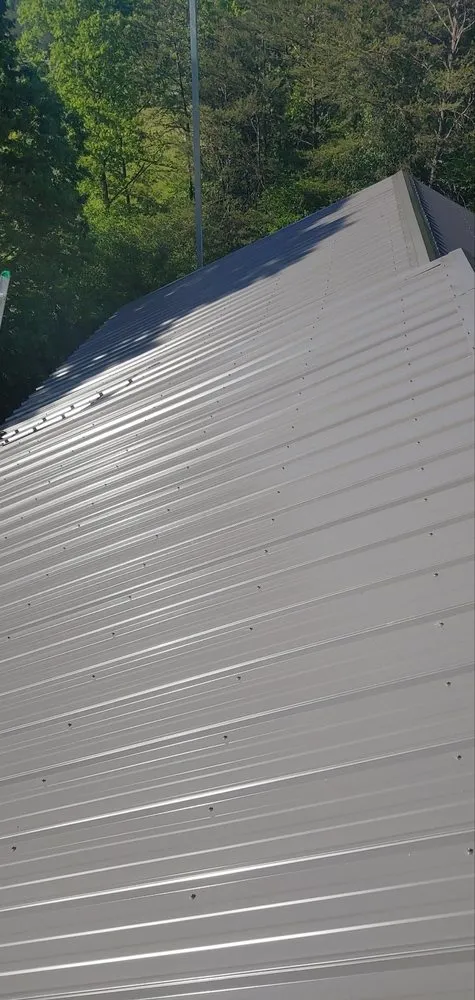 Slide of J'S Metal Roofing