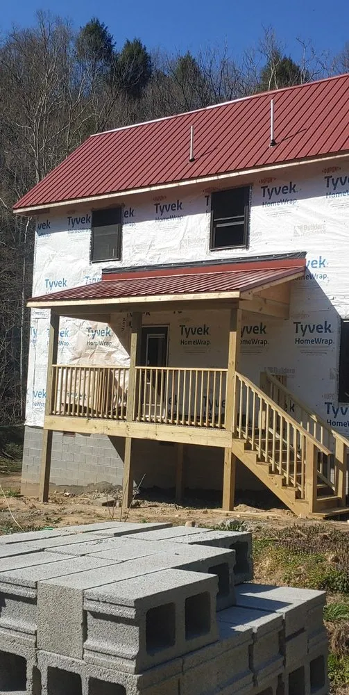 Slide of J'S Metal Roofing