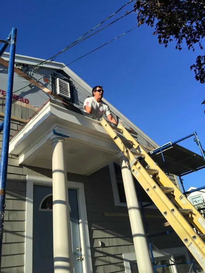 Slide of J&S Roofing Company