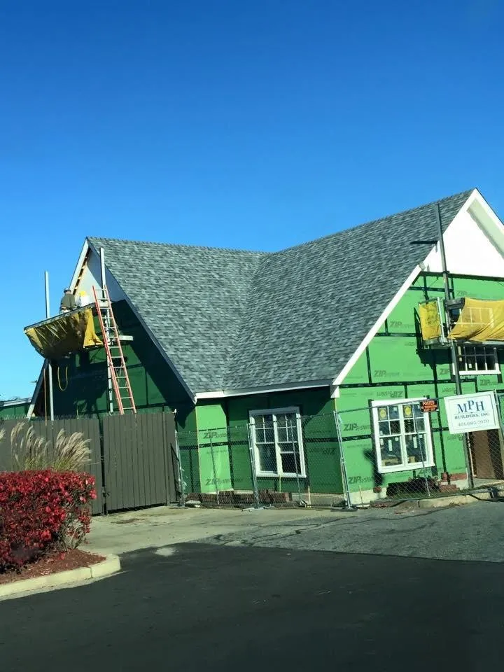 Slide of J&S Roofing Company