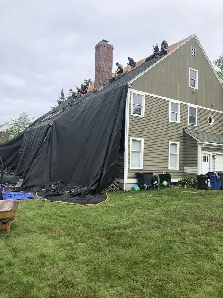 Slide of J&S Roofing Company