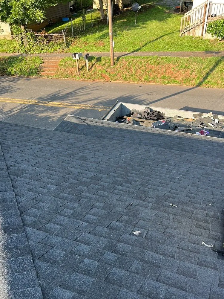 Slide of J’s Roofing