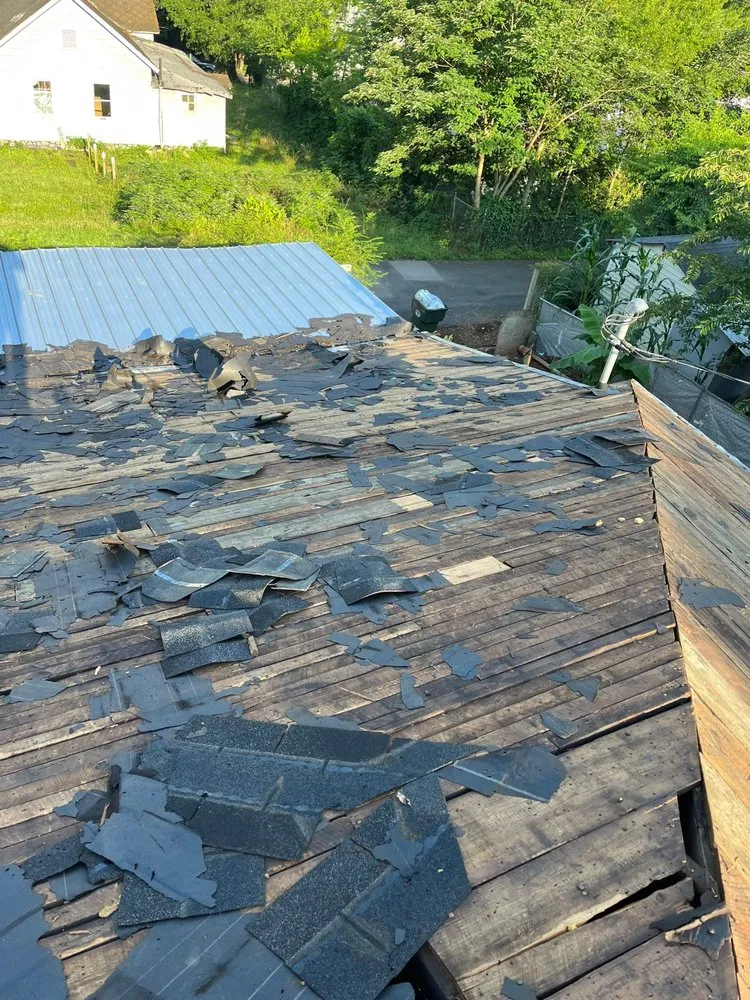 Slide of J’s Roofing