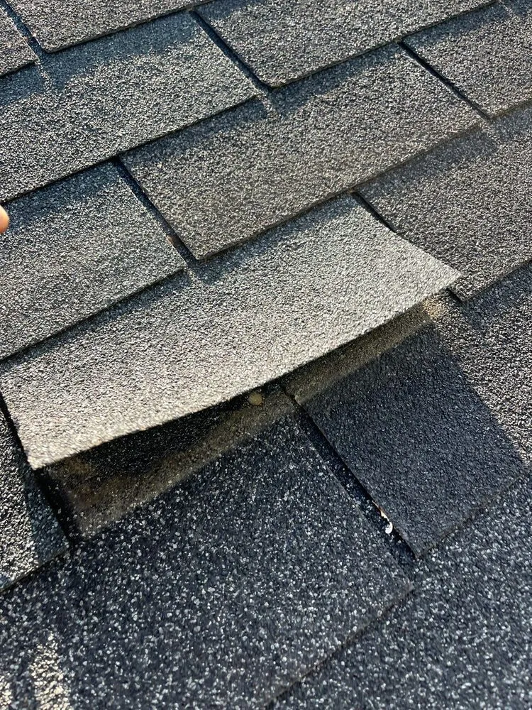 Slide of J’s Roofing
