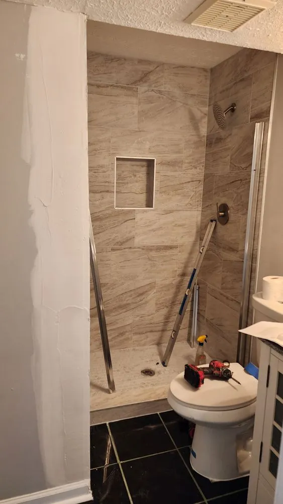 Slide of JS Roofing Group