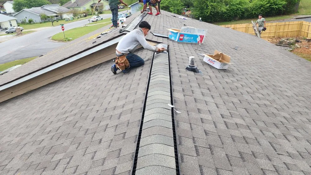 Slide of JS Roofing Group