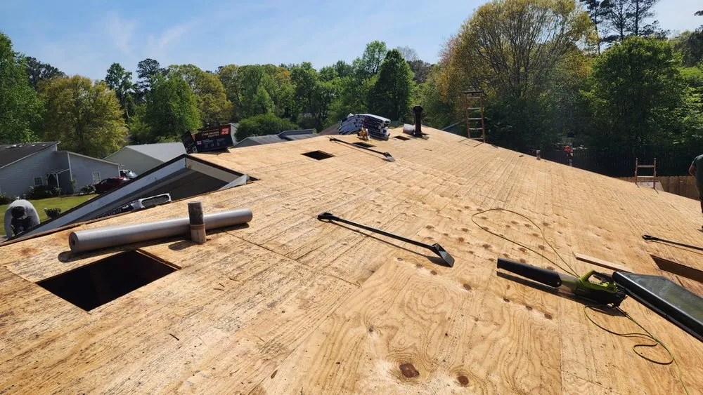 Slide of JS Roofing Group