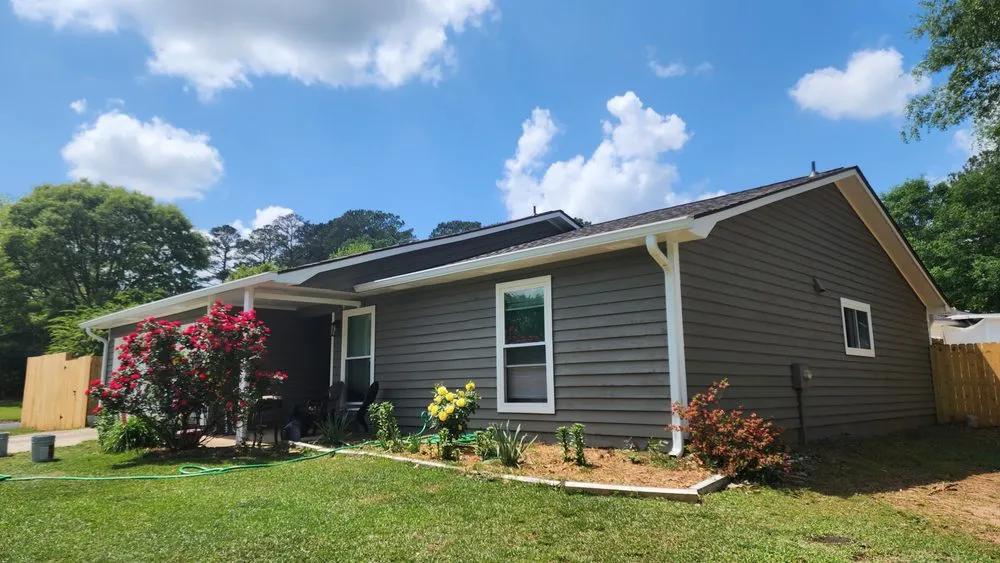 Slide of JS Roofing Group