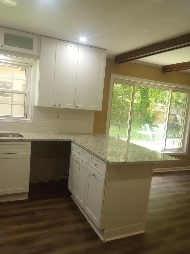 Slide of JS Roofing Group