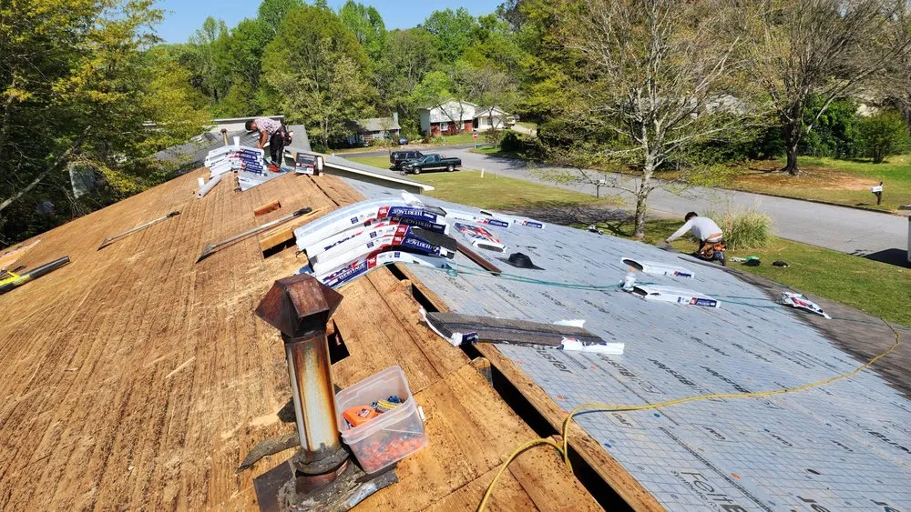 Slide of JS Roofing Group