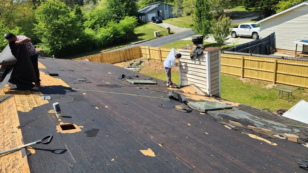 Slide of JS Roofing Group