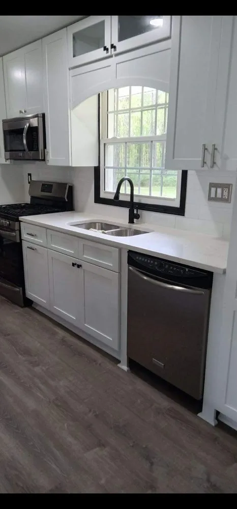 Slide of JS Roofing Group