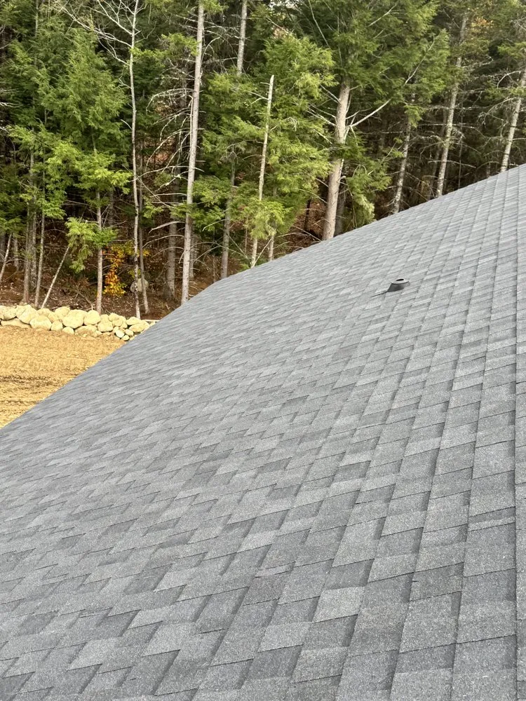 Slide of JSC Roofing Construction