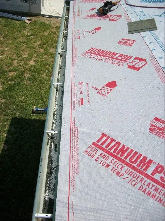 Slide of J&T Roofing