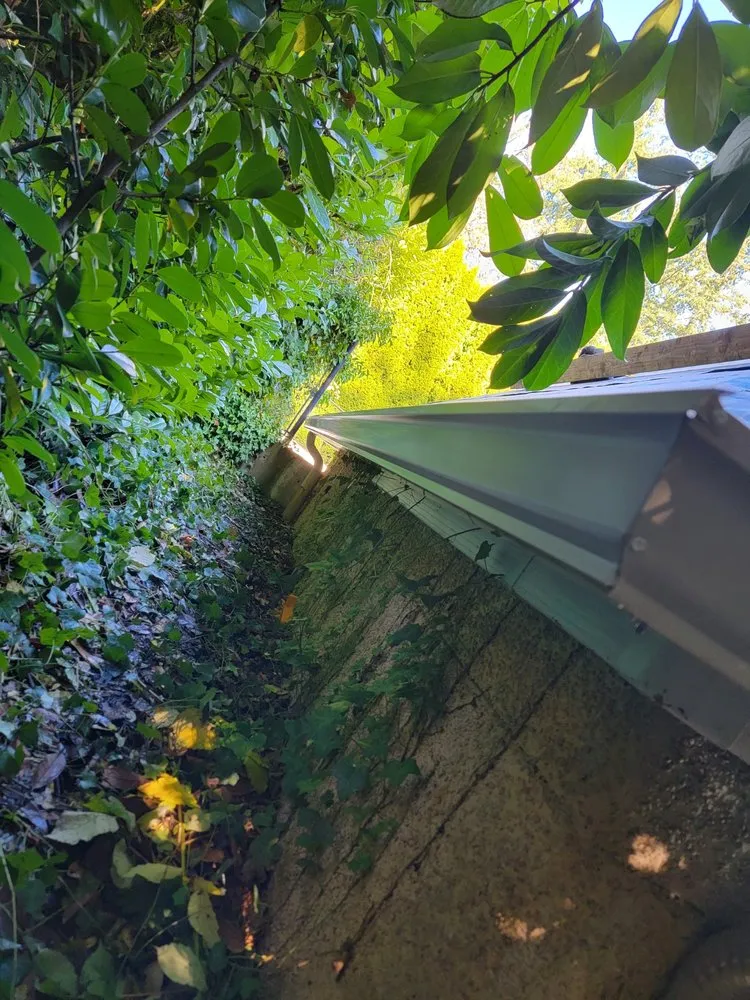 Slide of JT West Coast Gutter & Roofing