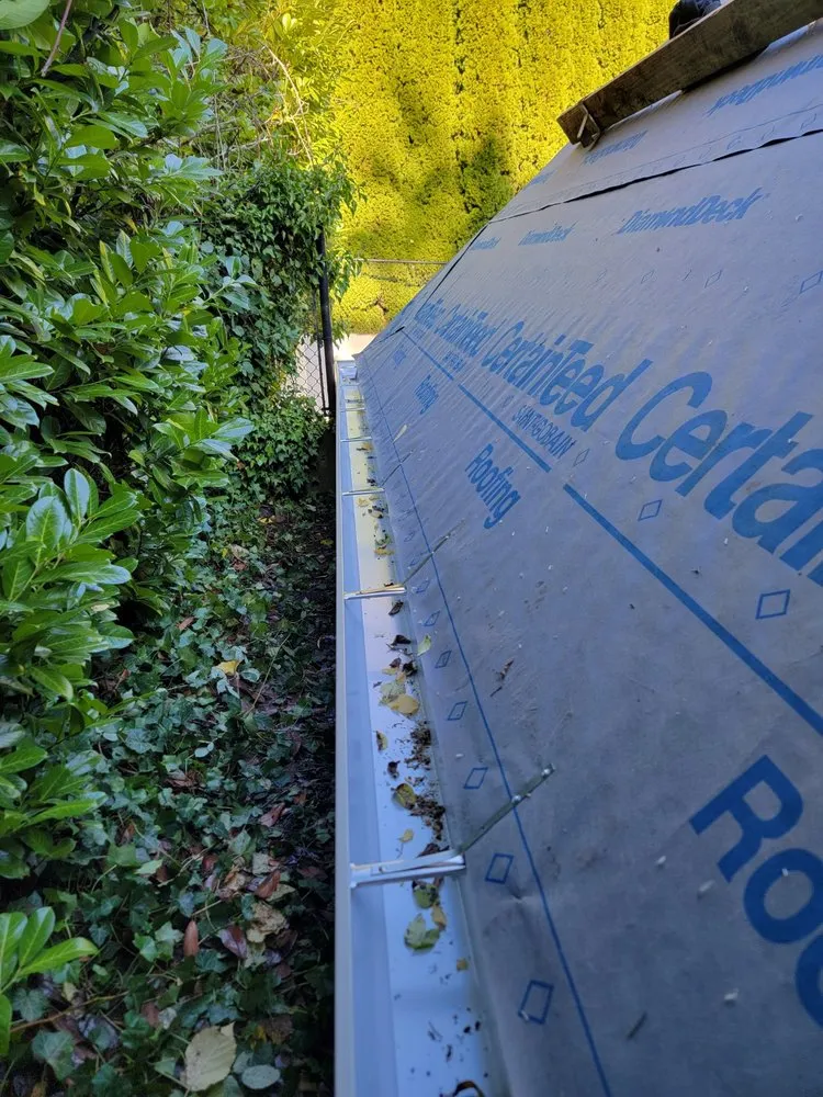 Slide of JT West Coast Gutter & Roofing