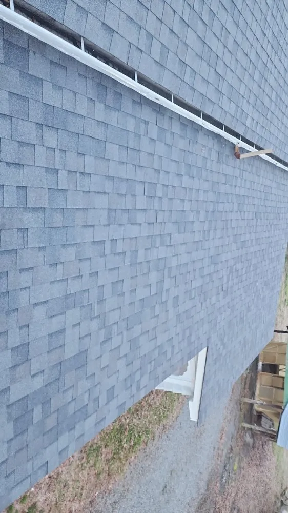 Slide of Juan Roofing