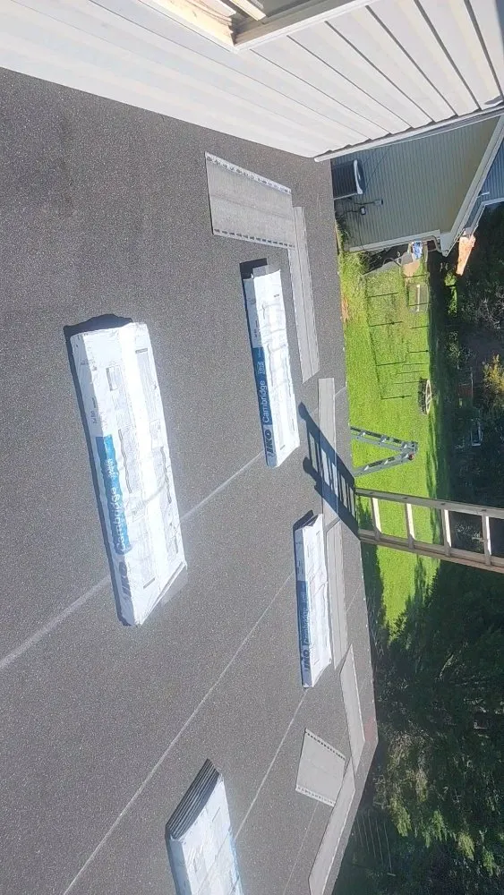 Slide of Juan Roofing