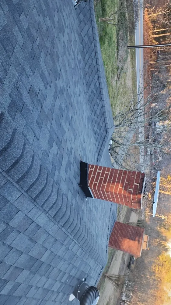 Slide of Juan Roofing