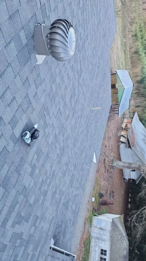 Slide of Juan Roofing