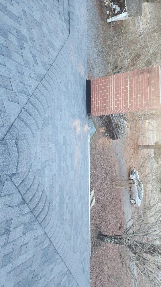 Slide of Juan Roofing