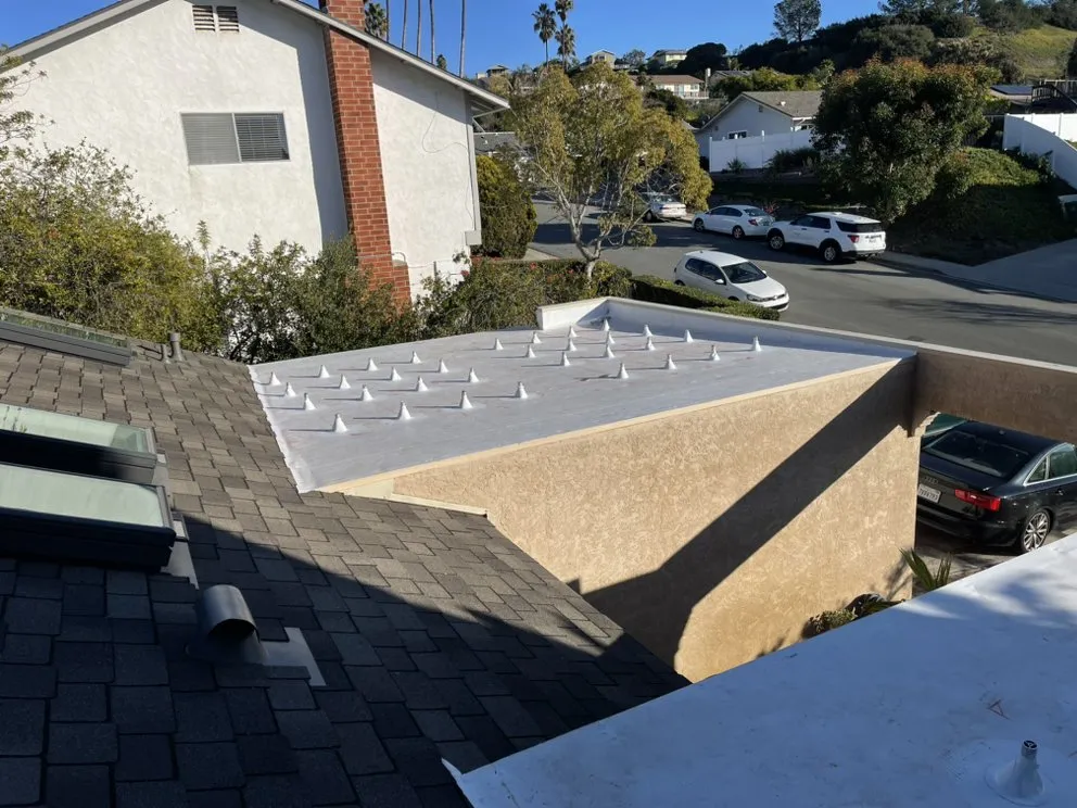 Slide of Juan's Pro Roofers