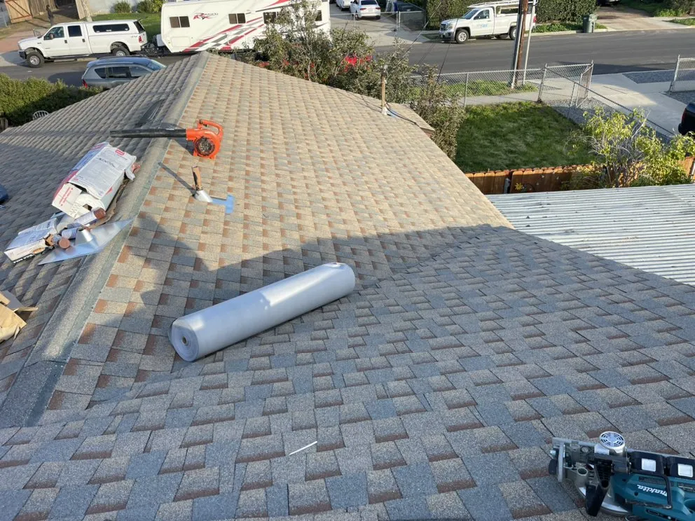 Slide of Juan's Pro Roofers