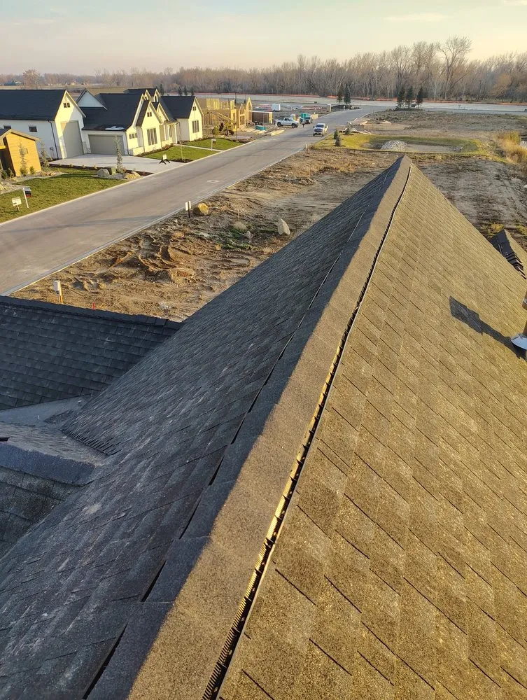 Slide of Juan’s Roofing