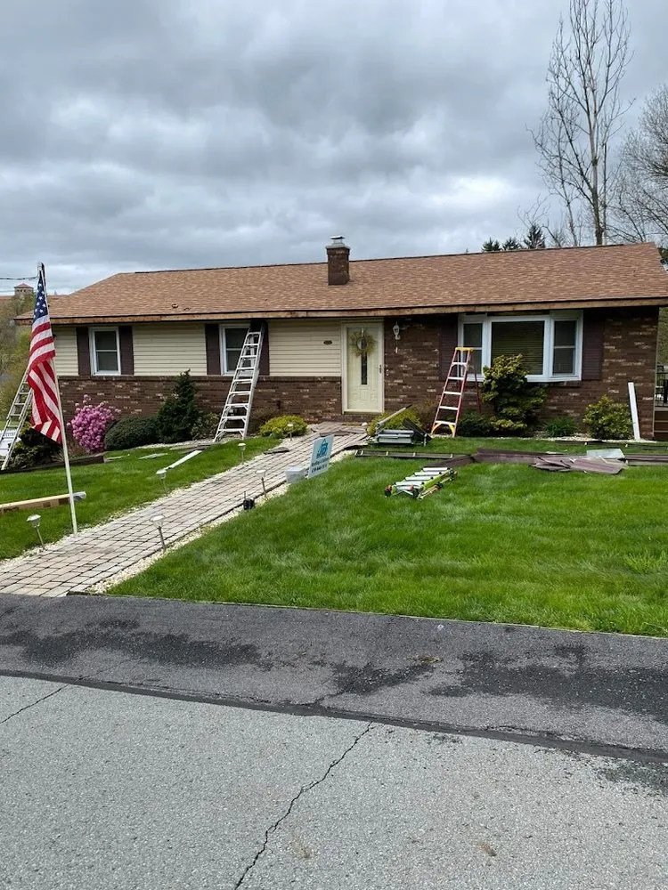 Reliable shingle roofing service after storm damage in North Abington Township, PA by Judge Brothers