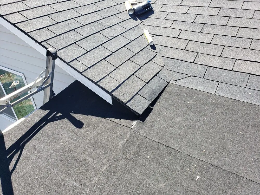 Slide of Julian's Roofing