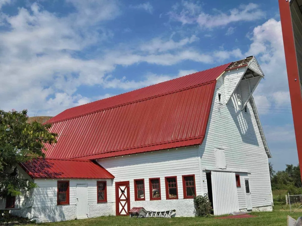 Slide of Junior Construction Roofing & Siding
