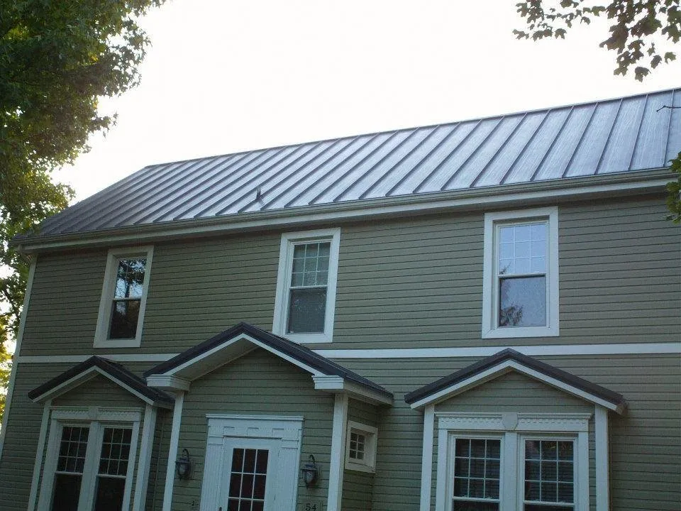 Slide of Junior Construction Roofing & Siding