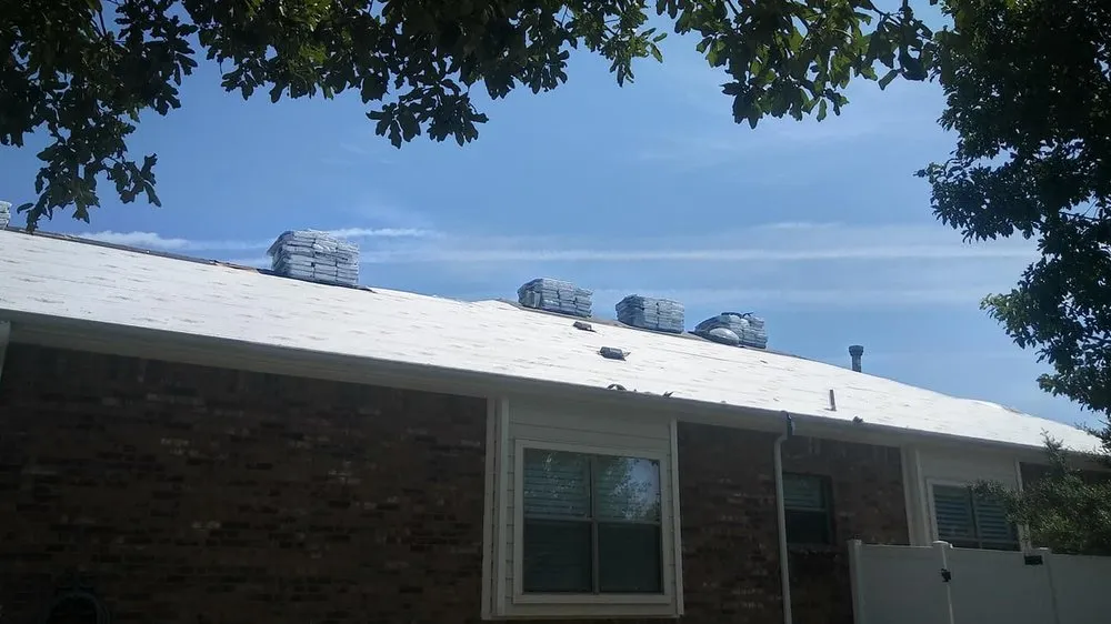 Slide of Junior Roofing & Repair