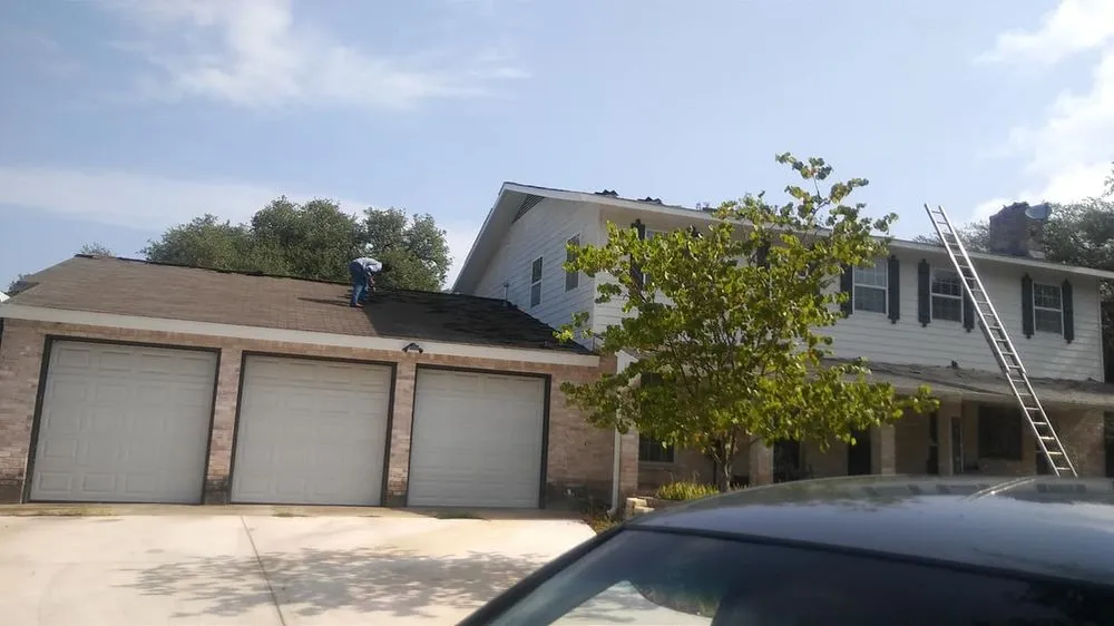 Slide of Junior Roofing & Repair